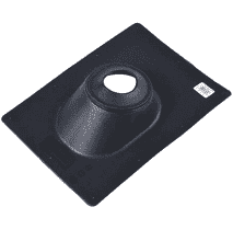 A dark rectangular mat or pad with rounded corners, shown on a solid green background. The center has a circular cutout, and there is a small white square detail in the upper right corner.