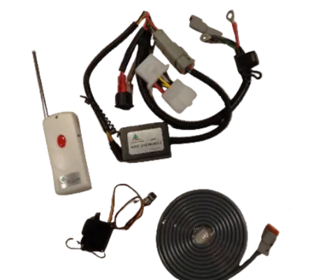 Generator remote control wiring kit with a white remote, black wiring harness, coiled black cable, small black component, and a white instruction card on a light beige surface.