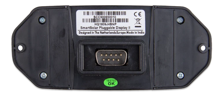 A black plastic SmartSolar Pluggable Display II module with a white label, a central DB25 connector port, and a green 'TESTED OK' sticker at the bottom.